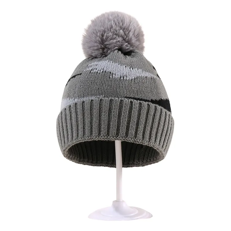 Bonnet bébé dino chaud gris